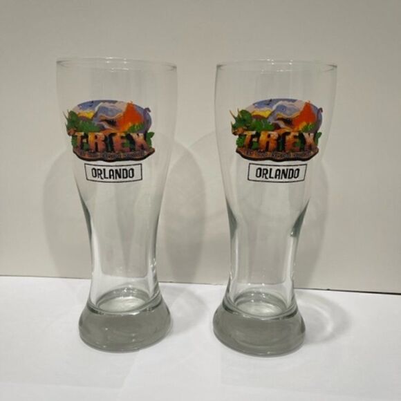 T-Rex "Eat Shop Explore Discover" restaurant pilsner glasses. Excellent conditio - Picture 1 of 5